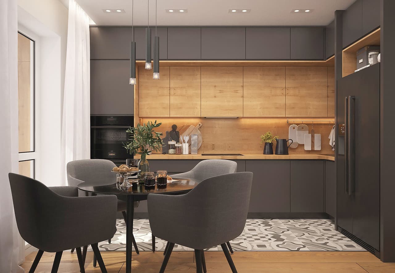Modern bespoke kitchen with dark charcoal cabinetry and warm backlit oak veneer